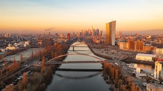 City skyline of Frankfurt, home of Colt DCS' new data center site, pictured at dusk.