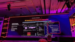 A screen on stage at .conf24 showing AI Assistant in Enterprise Security, with a visual breakdown of the features of the AI Assistant.